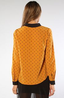 dv by dolce vita the daeja top in gold and navy sale $ 37 95 $ 90