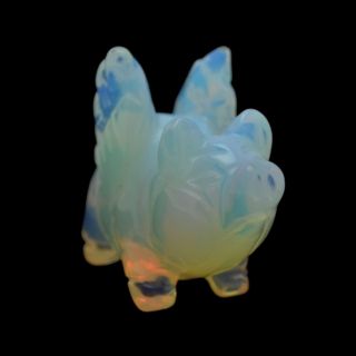 This Pig is unique and hand carved. We use authentic gemstones