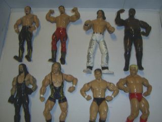 Lot of 8 Wrestling WWE WWF Action Figures