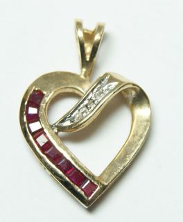 this solid 14k yellow gold heart shaped pendant features eight