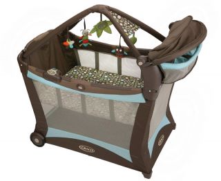 This playard features quilted padding, songs and sounds, and a dome