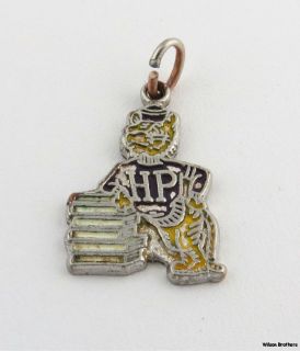 This charm features a panther mascot wearing an HP sweater and leaning