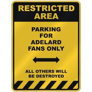 RESTRICTED AREA  PARKING FOR ADELARD FANS ONLY  PARKING SIGN NAME