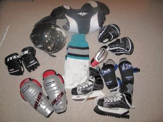 Ice Hockey Helmet Skates and Protective Gear