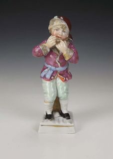 Antique Dresden Porcelain Januarius Boy Figure, produced in the 19th