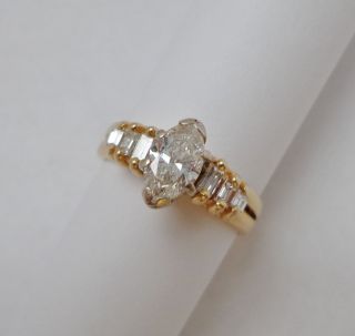 Marquise cut Diamond Solitaire .90 carat   w/.20 carats in 14K Solid