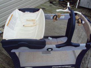 GRACO PACK N PLAY WITH CHANGING TABLE, MOBILE AND ALL THE BELLS AND