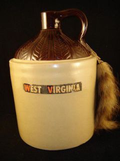 West Virginia Mountain Moonshine pottery jug Raccoon tail whiskey