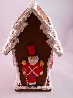 Fake Gingerbread House with Santa Birdhouse