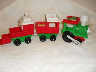 FISHER PRICE LITTLE PEOPLE CHRISTMAS TRAIN PLAYS MUSIC.