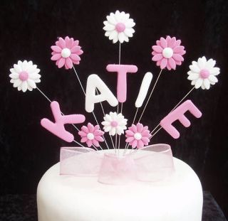CHRISTENING/HO LY COMMUNION NAME CAKE TOPPER WITH DASIES