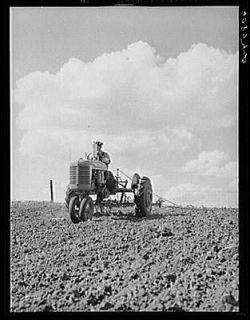 PhotoCorn planting with two row tractor planter. Jasper County,Iowa