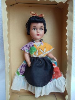 VINTAGE DOLL. IN TRADITIONAL MEXICAN DRESS 9 TALL IN GOOD CONDITION