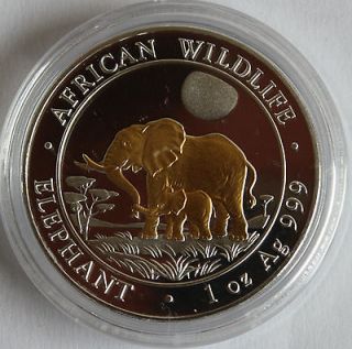 2011 SOMALIA ELEPHANT, 1 OZ GILDED BU SILVER, IN UNOPENED 39 MM COIN