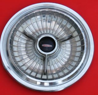 1963 Olds deluxe w/spinner hub cap with white ring