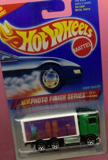 HOT WHEELS 335 HIWAY HAULER TWIN TOWER PRINT GREEN BLUE AND WHITE CARD