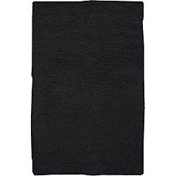 Hand woven Black Plush Shag Wool Santa Fe Rug (26 X 8) (BlackTip We recommend the use of a non skid pad to keep the rug in place on smooth surfaces.All rug sizes are approximate. Due to the difference of monitor colors, some rug colors may vary slightly.