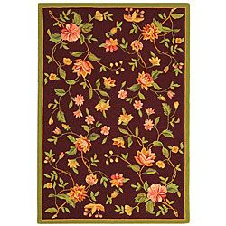 Hand hooked Garden Burgundy Wool Rug (39 X 59) (RedPattern FloralMeasures 0.375 inch thickTip We recommend the use of a non skid pad to keep the rug in place on smooth surfaces.All rug sizes are approximate. Due to the difference of monitor colors, some