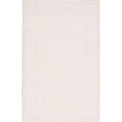 Nourison Hand tufted Westport Ivory Wool Rug (5 X 8) (ivoryPattern SolidMeasures 3/4 inch thickTip We recommend the use of a non skid pad to keep the rug in place on smooth surfaces.All rug sizes are approximate. Due to the difference of monitor colors,