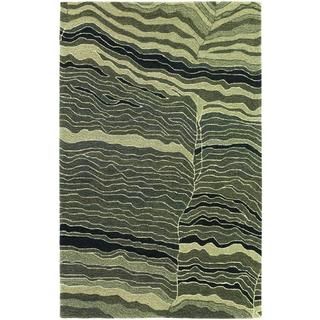 Super Indo natural Tectonic/grey Rug (36 X 56) (GreySecondary Colors Bone, burnt kindling, and mushroomPattern WavesTip We recommend the use of a non skid pad to keep the rug in place on smooth surfaces.All rug sizes are approximate. Due to the differe