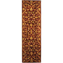 Handmade Exquisite Wine/ Gold Wool Runner (23 X 8) (RedPattern OrientalMeasures 0.625 inch thickTip We recommend the use of a non skid pad to keep the rug in place on smooth surfaces.All rug sizes are approximate. Due to the difference of monitor colors