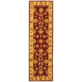 Handmade Heritage Kerman Red/ Gold Wool Runner (23 X 12) (RedPattern OrientalMeasures 0.625 inch thickTip We recommend the use of a non skid pad to keep the rug in place on smooth surfaces.All rug sizes are approximate. Due to the difference of monitor 