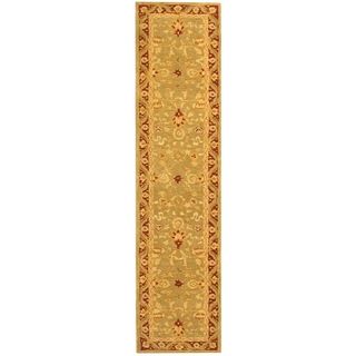 Handmade Kashan Green/ Red Wool Runner (23 X 10) (GreenPattern OrientalMeasures 0.625 inch thickTip We recommend the use of a non skid pad to keep the rug in place on smooth surfaces.All rug sizes are approximate. Due to the difference of monitor colors